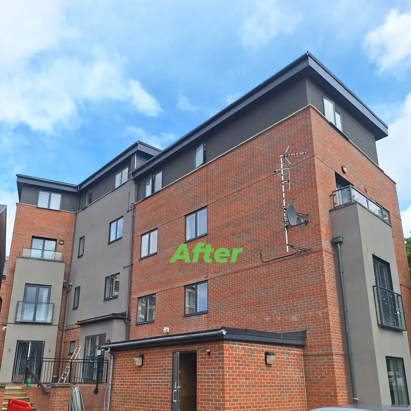 Apartment block after: cladding and render re-coated in anthracite and grey cork