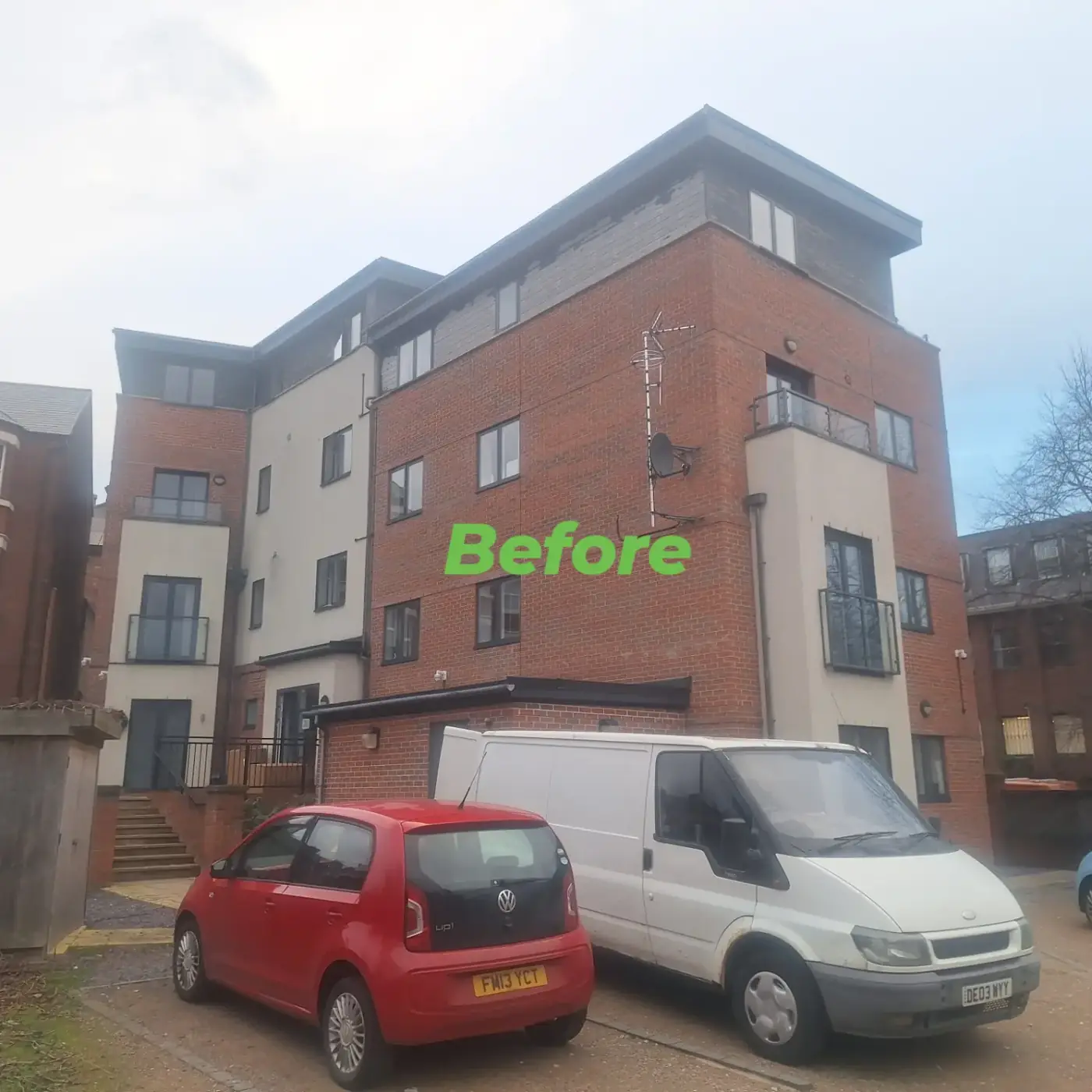 Apartment block before: peeling paint on the upper-storey cladding